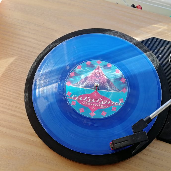 A blue record on a record player